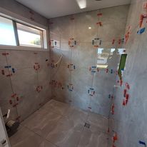 Bathroom tiling by jar group tiling